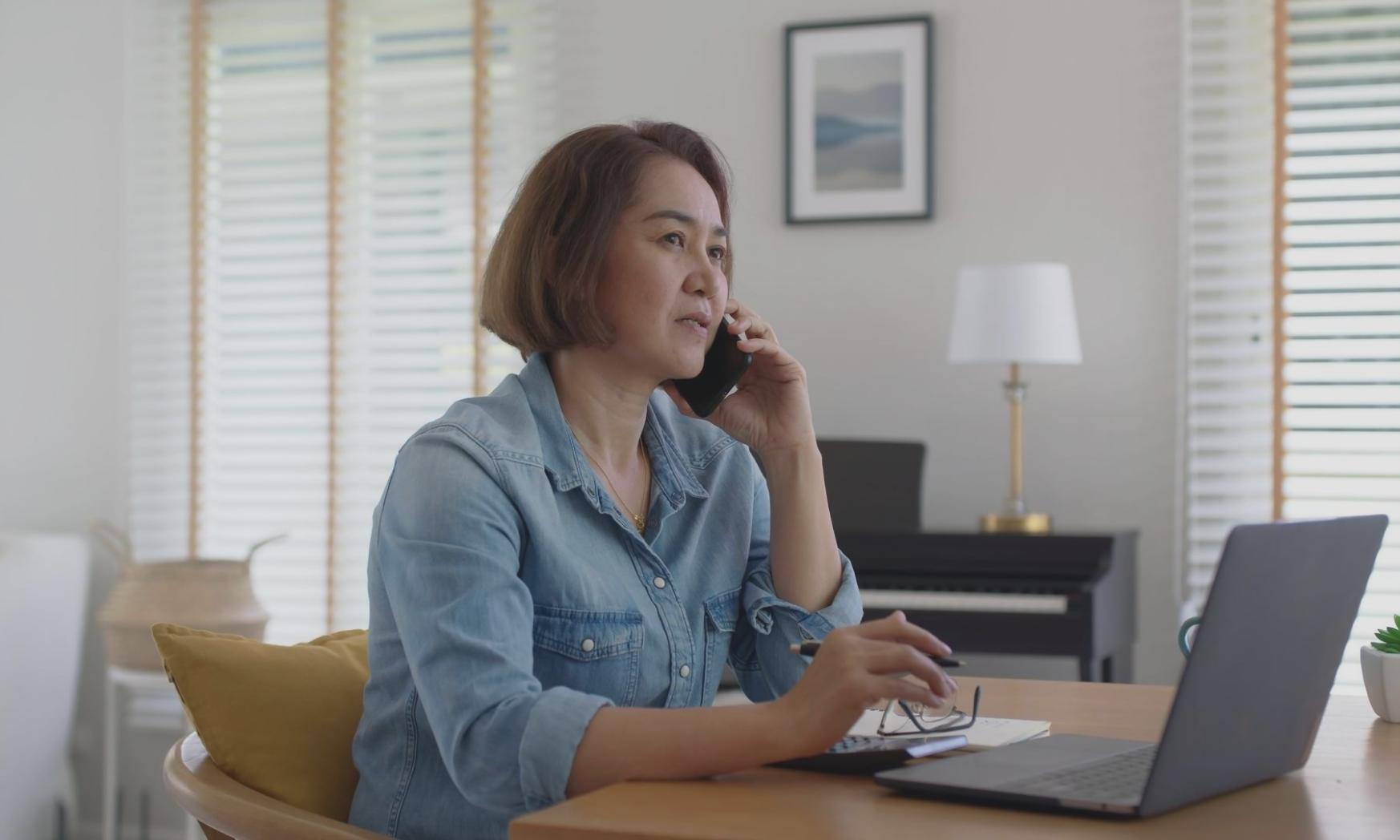 Financial analysis workspace with charts and analytical tools displayed on screens